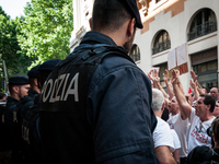 Employees of Whirlpool headquarters in Naples demonstrate against the closure of the plant at the Ministry of Economic Development on June 4...