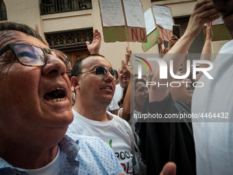 Employees of Whirlpool headquarters in Naples demonstrate against the closure of the plant at the Ministry of Economic Development on June 4...