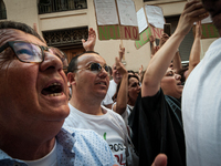 Employees of Whirlpool headquarters in Naples demonstrate against the closure of the plant at the Ministry of Economic Development on June 4...