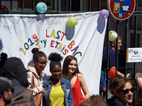 Students pose in front of a sheet reading '2019 Last Baccalaureate, I was there !'. Some high school teachers were on strike against the bil...