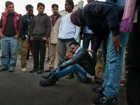 A migrants is assisted by his colleagues after reporting a police attack near the port. Calais, France, June 2014.

For the last 20 years...