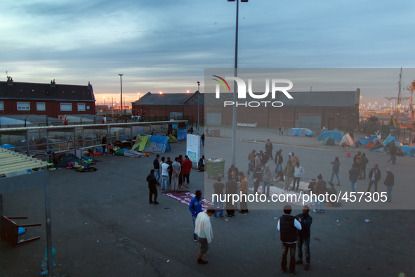 View of the migrant camp in the evening. Calais, France, June 2014.

For the last 20 years the French city of Calais, with links from the...