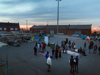 View of the migrant camp in the evening. Calais, France, June 2014.

For the last 20 years the French city of Calais, with links from the...