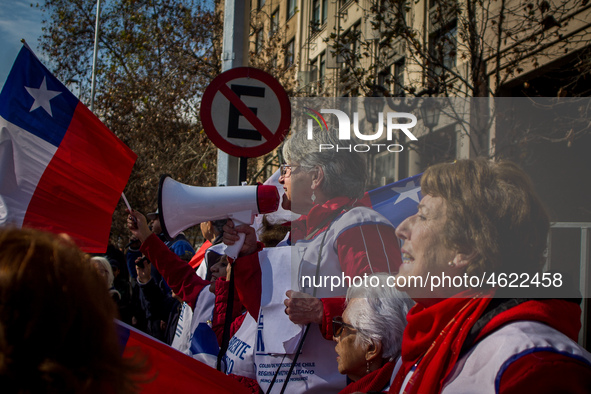 Teachers take part in a demonstration in Santiago de Chile, Chile, on July 3, 2019. 