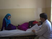 Afghan schoolgirls receive medical treatment at a local hospital after being admitted for symptoms of poisoning, in Badakhshan, Afghanistan,...