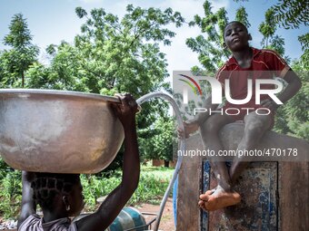 A young boy controls and distributes the water to the population in the city of Dano
"The land of honest man". With these words Shankara ha...