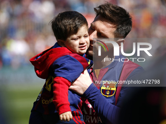 BARCELONA - march 08- SPAIN: Messi with his son crying in the match between FC Barcelona and Rayo Vallecano, for the week 26 of the spanish...