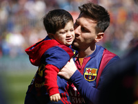 BARCELONA - march 08- SPAIN: Messi with his son crying in the match between FC Barcelona and Rayo Vallecano, for the week 26 of the spanish...
