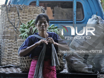 Female freight workers serve customers in Beringharjo traditional market, Special Region of Yogyakarta province, on Monday, August 5, 2019....