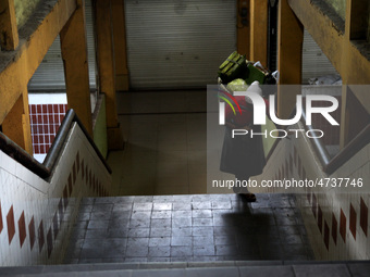 Female freight workers serve customers in Beringharjo traditional market, Special Region of Yogyakarta province, on Monday, August 5, 2019....