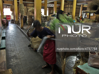 Female freight workers serve customers in Beringharjo traditional market, Special Region of Yogyakarta province, on Monday, August 5, 2019....