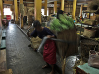 Female freight workers serve customers in Beringharjo traditional market, Special Region of Yogyakarta province, on Monday, August 5, 2019....