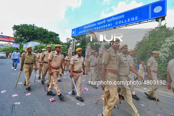 Police patrolling during the Rajasthan University Students Union (RUSU) election polling, outside Maharani College in Jaipur, Rajasthan, Ind...