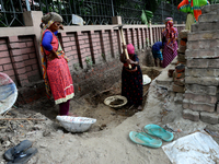 Bangladeshi women day laborer works in a road construction site in Dhaka, Bangladesh, on September 7, 2019. (