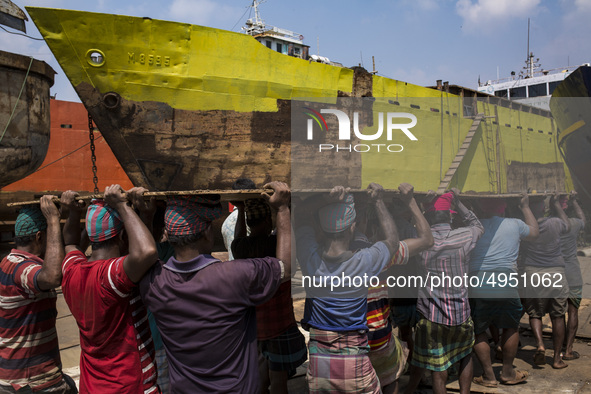 Bangladeshi labourer work in a dockyard beside the Buriganga River in Dhaka, Bangladesh on October 04, 2019.
There are  twenty-eight dockyar...