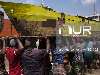 Bangladeshi labourer work in a dockyard beside the Buriganga River in Dhaka, Bangladesh on October 04, 2019.
There are  twenty-eight dockyar...