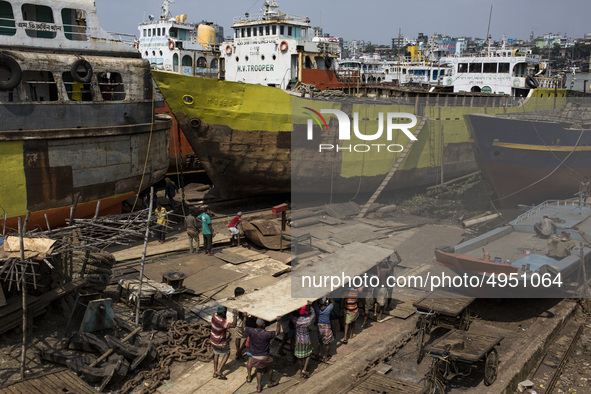 Bangladeshi labourer work in a dockyard beside the Buriganga River in Dhaka, Bangladesh on October 04, 2019.
There are  twenty-eight dockyar...