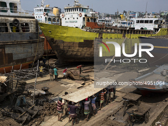 Bangladeshi labourer work in a dockyard beside the Buriganga River in Dhaka, Bangladesh on October 04, 2019.
There are  twenty-eight dockyar...