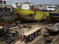 Bangladeshi labourer work in a dockyard beside the Buriganga River in Dhaka, Bangladesh on October 04, 2019.
There are  twenty-eight dockyar...