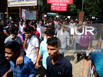 Bangladeshi admission seekers exit Buet premises in line ahead of the tests amid tight security in Dhaka, Bangladesh, on October 14, 2019.Th...