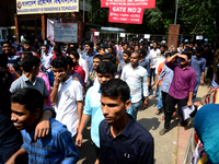 Bangladeshi admission seekers exit Buet premises in line ahead of the tests amid tight security in Dhaka, Bangladesh, on October 14, 2019.Th...