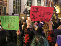 Protester holding sign that says 'safe sex is not a taboo'  during the rally against a bill that would criminalize sex education is seen in...