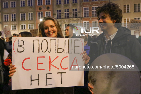 Protester holding sign that says in Russian 'In Poland there is no sex'  during the rally against a bill that would criminalize sex educatio...