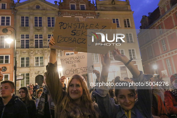 Protester holding sign that says 'you arose from sex, see how' during the rally against a bill that would criminalize sex education is seen...