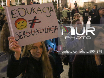Protester holding sign that says 'education is not a sexualization' during the rally against a bill that would criminalize sex education is...