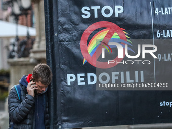 Protester holding sign that says 'Stop Pedophilia'  during the rally against a sexual education in Polish schools, supporting a bill that wo...