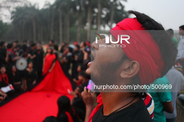 Bangladeshi social activist of Lal Jatra made a rally with street performance act and song to remember the genocide of Bangladeshi people wh...