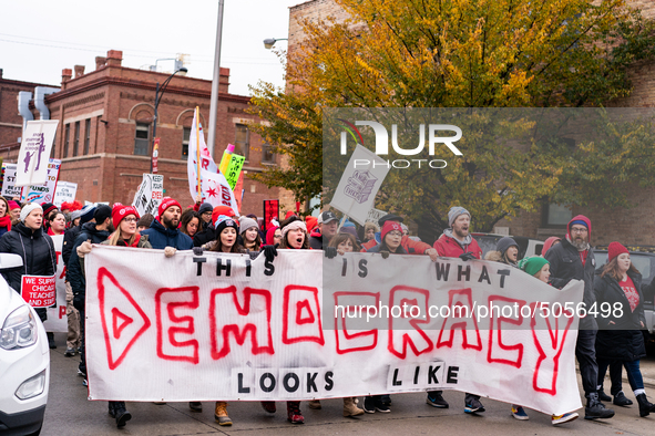 Striking teachers and supporters march into the Lincoln Yards development site in Chicago on October 29, 2019. The Chicago Teachers Union is...