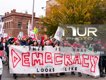 Striking teachers and supporters march into the Lincoln Yards development site in Chicago on October 29, 2019. The Chicago Teachers Union is...