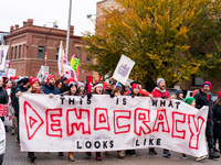 Striking teachers and supporters march into the Lincoln Yards development site in Chicago on October 29, 2019. The Chicago Teachers Union is...