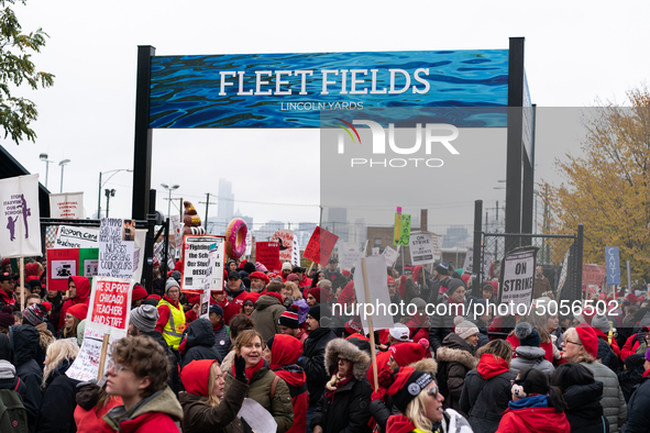 Thousands of striking teachers and supporters arrive for a rally at the Lincoln Yards development site in Chicago on October 29, 2019. The C...