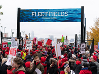 Thousands of striking teachers and supporters arrive for a rally at the Lincoln Yards development site in Chicago on October 29, 2019. The C...