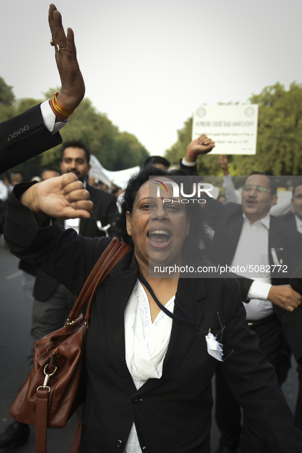 Lawyers march towards India Gate from the Supreme Court premises as they protest against Delhi Police on 4 November 2019 in New Delhi, India...