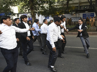 Lawyers march towards India Gate from the Supreme Court premises as they protest against Delhi Police on 4 November 2019 in New Delhi, India...