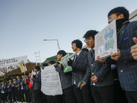 Nov 14, 2019 - Sangju, South Korea-A Group of High Schoolers cheer up for their senior group at entrance gate of Sangju high school in Sangj...