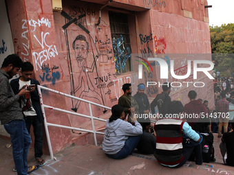 A view of an anti-administration slogan painted by the protesting students who are demanding the roll back of the hostel fee hike, at Jawaha...