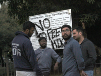 A view of an anti-administration slogan painted by the protesting students who are demanding the roll back of the hostel fee hike, at Jawaha...