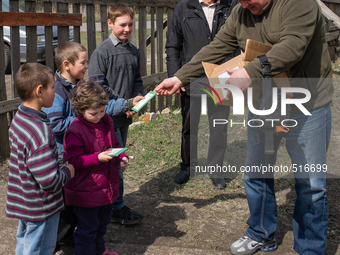 Pastor Ivanov distributing cookies and chocolate to the kids coming for his visit. On April 6 2015, we visit Krasnogorovka. What we saw is t...