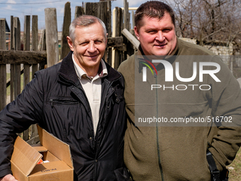 On the left, Pastor Vladimir Priadka of the Kovcheg protestant church in Krasnogorovka posing with pastor Ivanov. On April 6 2015, we visit...