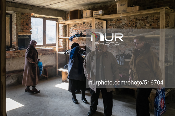 Room inside the protestant church, were the clothes that pastor Ivanov and others bring, are stock and distributed to the local population....