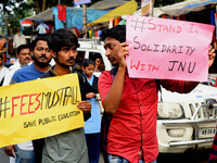 Students, Alumni of  Jawaharlal Nehru University  (JNU) at the part in the a protest rally against Center Modi Goverment apple to the Save P...