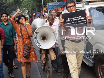 Students, Alumni of  Jawaharlal Nehru University  (JNU) at the part in the a protest rally against Center Modi Goverment apple to the Save P...