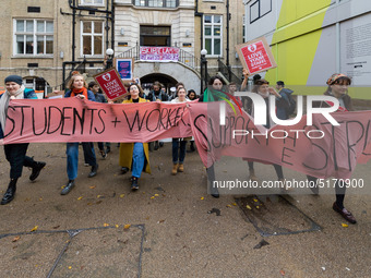 Higher and further education staff and students take part in a protest march at University College London (UCL) campus in support of univers...