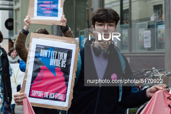 Higher and further education staff and students take part in a protest march outside University College London (UCL) buildings in support of...