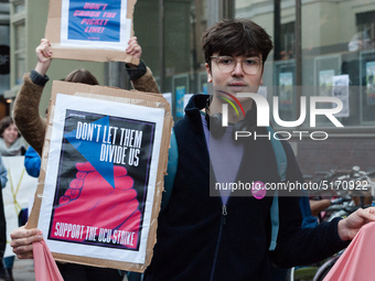 Higher and further education staff and students take part in a protest march outside University College London (UCL) buildings in support of...