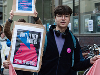 Higher and further education staff and students take part in a protest march outside University College London (UCL) buildings in support of...